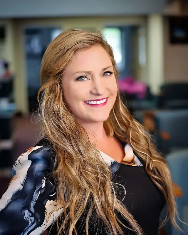 Janelle, office manager at Munroe Chiropractic in Williamsville, NY